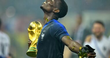 Paul Pogba, pictured here winning the 2018 World Cup with France, has been banned from football for four years for doping