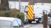Police have arrested a woman on suspicion of murder after three children were found dead at an address in Blaise Walk, Sea Mills in Bristol. Pictured: Police at the scene this afternoon