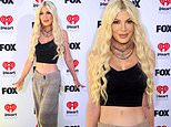 Ab-flashing Tori Spelling hits the red carpet as she's seen for FIRST time since filing for divorce from Dean McDermott at iHeartRadio Awards