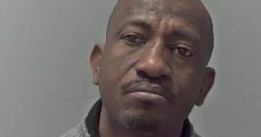 Olubunmi Abodunde (pictured) beat his wife to death with their son's skateboard while police waited outside for permission to enter from their superiors