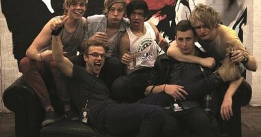 The man behind the band: Australian boy band 5 Seconds Of Summer know they owe their stardom to Adam Wilkinson (pictured second from right) after a chance meeting back in 2011