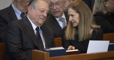 Former Vice President Al Gore, left, and speaks with Connecticut Lt. Gov. Susan Bysiewicz at the funeral of former Senator Joe Lieberman, in Stamford, Connecticut. He hailed Lieberman as a 'mensch' and spoke openly about difficulties in their friendship