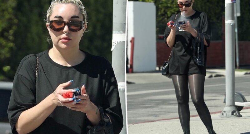Amanda Bynes goes on her phone, smokes vape during outing in LA