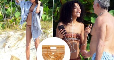 Aoki Lee Simmons styles her bikini with an $118 ‘It’ bag for beach day with Vittorio Assaf