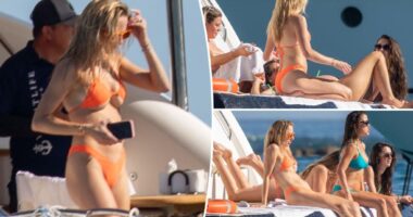 Brittany Mahomes sports tiny orange bikini on boat trip with her gal pals