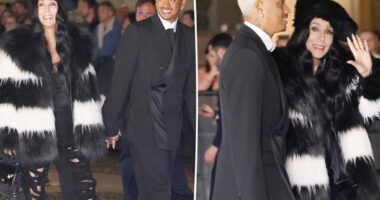 Cher, 77, and boyfriend Alexander 'AE' Edwards, 38, pack on the PDA at Dolce & Gabbana event in Milan