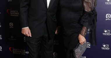 Dame Joan Collins cut a glamorous figure as she stepped out to the Variety Club Showbusiness Awards with her husband Percy Gibson at The Londoner Hotel in the UK capital on Sunday