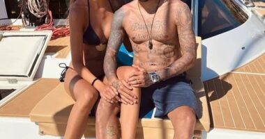 Dani Alves appears to have been reconciled with wife Joana Sanz, 31, (pictured on holiday a few years ago) after being released from bail
