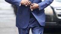 Denzel Washinton, 69, looked handsome in a blue three-piece suit for his scene on the streets of NYC