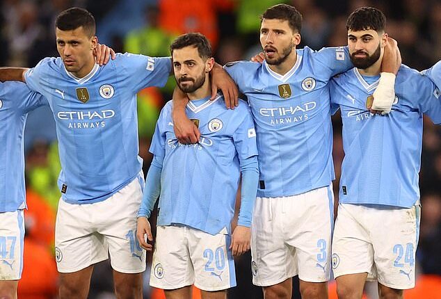 Bernardo Silva (second left) was made to wait before taking - and missing - his penalty against Real Madrid