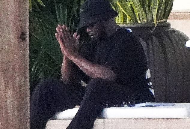 Diddy pictued looking stressed  outside his Miami mansion amid mounting lawsuits and sex trafficking probe (Photos)