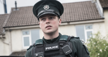 Nathan Braniff as Tommy Foster in police uniform in BBC One's Blue Lights