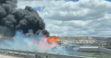 Freight train derailment, fire forces Interstate 40 closure near Arizona-New Mexico line