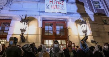 A group of students advocating for Palestine at Columbia University stage a demonstration and block the entrance of iconic Hamilton Hall. Students draped a banner that read 'Hind's Hall' in honor of Hind Rajab, 6, who died in Gaza in January