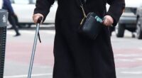 Kathleen Turner looked unrecognizable during a rare public outing in Downtown Manhattan Monday, seen walking with a cane on Chinatown's Canal Street