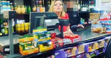 Nikolova is also seen standing behind the counter of Antonia's Foods in Wood Green, pouting at the camera alongside an unknown man