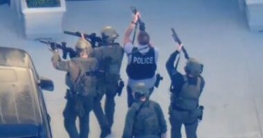 Helicopters overhead caught the moment when police surrounded the property. One intruder was shot by a resident, while another was found dead with a gunshot wound to the head