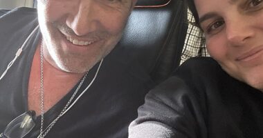 Paul Faust, pictured with fellow passenger Rachelle Almagor on the JetBlue flight, has accused the airline of anti-Semitism
