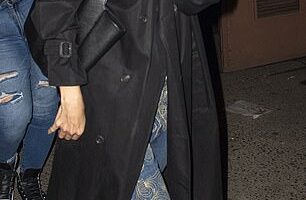 Katie Holmes was spotted enjoying dinner with a male friend in New York City on Thursday, while her daughter Suri Cruise celebrated her 18th birthday elsewhere