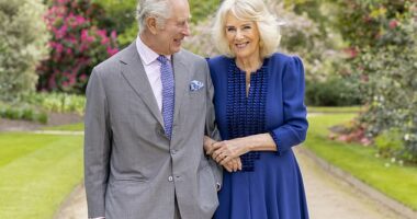 Arm in arm with his strength and stay, the monarch smiled broadly as he walked linked with his wife through the blossoming Buckingham Palace gardens
