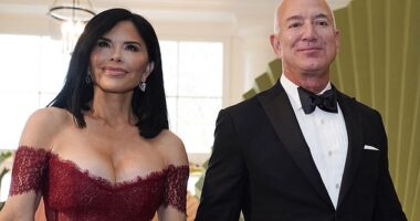 The 54-year-old wore a red Rasario off-shoulder lace and satin gown with a corset that retails for $2,200 for the event