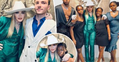 Madonna poses for photos at son Rocco Ritchie's art show