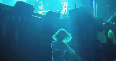Mick Jagger's lookalike son Deveraux, seven, proved he's got his father's moves as he danced like nobody was watching during his Texas tour on Sunday
