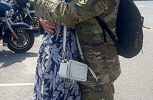 Nikki Haley embraces her husband Michael after returning from deployment