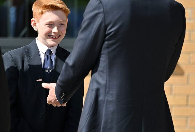 The Prince of Wales surprised schoolboy Freddie Hadley, 12, as he arrived at his school in the West Midlands today