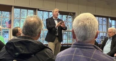 Republican House candidate Mark Houck addresses a crowd of GOP voters a week before Tuesday's primary election. He is attempting to unseat four-term Rep. Brian Fitzpatrick