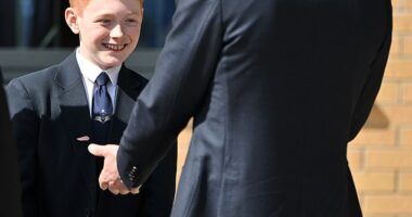 Prince William greeted Freddie Hadley (left) today, praising him for his 'very well written' letter outlining his school's mental health initiatives