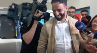 Ruben Amorim was met by a swarm of journalists after landing back in Portugal on Tuesday