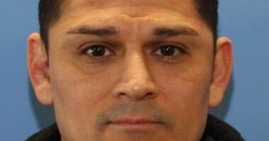 A second homicide victim has been discovered at the home of the man suspected of fatally shooting an adult woman outside an elementary school , as its revealed he's an ex-cop facing sexual assault charges against underage girls. Pictured: Suspect Elias Huizar, 39