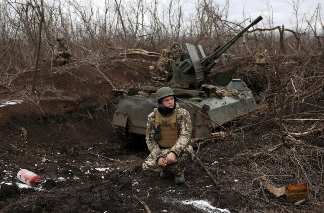 TOPSHOT - Ukrainian anti-aircraft gunners of the 93rd Separate Mechanized Brigade Kholodny Yar monitor the sky from their positions in the direction of Bakhmut in the Donetsk region, amid the Russian invasion of Ukraine, on February 20, 2024. (Photo by Anatolii STEPANOV / AFP) (Photo by ANATOLII STEPANOV/AFP via Getty Images)