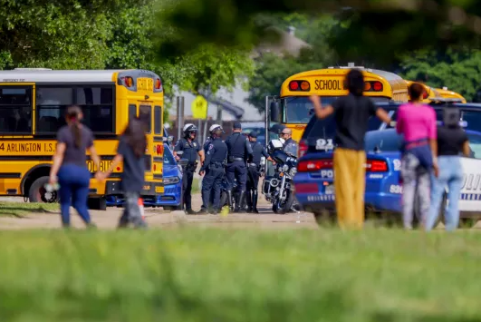 Student killed and another arrested in Texas high school shooting