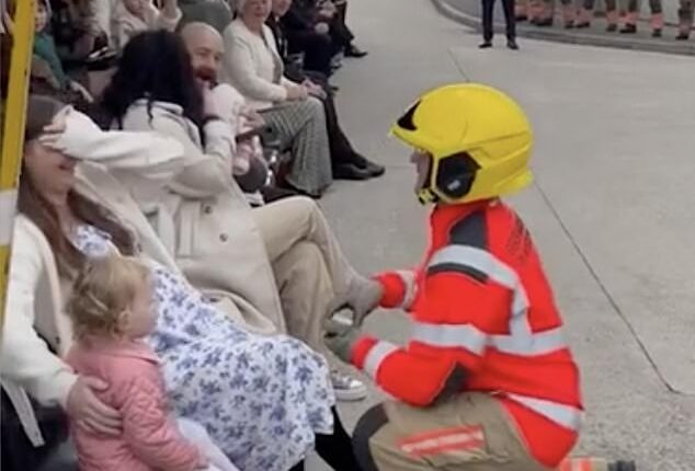 Greater Manchester Fire Department have shared a clip of the special moment a newly-qualified firefighter proposed to his girlfriend at his pass-out parade