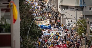 Demonstrators packed into Weyler Square in the Tenerife capital Santa Cruz, the start point for a march on the Brit-popular holiday island
