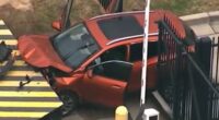 Vehicle Crashes Into FBI Security Gate