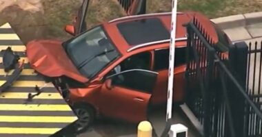 Vehicle Crashes Into FBI Security Gate