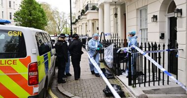 Police and forensic scene of crime officers outside a home in Stanhope Place, London, yards from the city's iconic Hyde Park