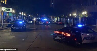 Mass shooting rocks major Alabama city as four killed and at least 18 injured in cigar lounge bloodbath
