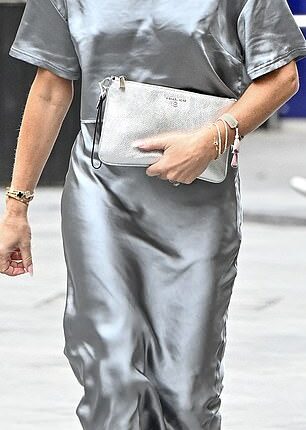 Amanda Holden, (left)a looked sheepish as she copied her co-star Ashley Roberts's entire outfit on Monday just four days after she wore it to work