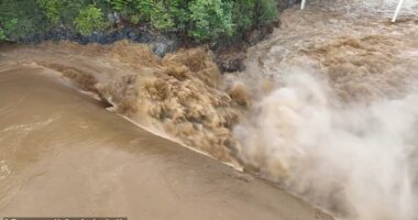 Pictured: The Nolichucky Dam in Eastern Tennessee. The dam was bursting with 30,000 cubic feet of water per second about a day ago