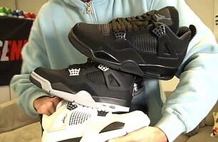 Benjamin Luke Giles (pictured with a stack of fake sneakers)  has spent $50,000 on counterfeit items