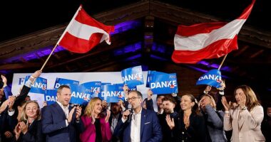 Herbert Kickl speaks at a rally as projections show his Freedom Party have won the most votes at the general election
