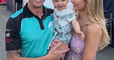 V8 Supercars star James Courtney and his wife Tegan Woodford are expecting their second child. (Pictured in 2023 with their son Kobe)