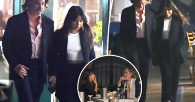 Chris Pine holds hands with mystery woman during date night in Portofino