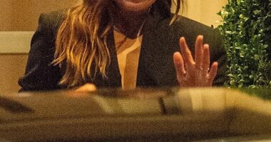 Elizabeth Olsen, 35, put on an animated display as she stepped out with Carrie Coon, 43, for a special screening of His Three Daughters at The Soho Hotel on Monday night