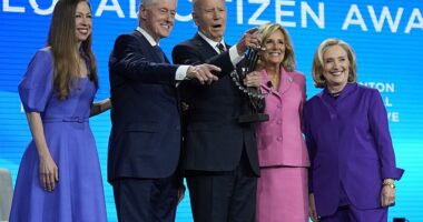 President Joe Biden and first lady Jill Biden pose for a photo after he was presented with the Global Citizen Award by former President Bill Clinton, Chelsea Clinton and former Secretary of State Hillary Clinton at the Clinton Global Initiative