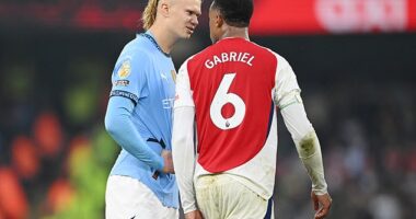 Erling Haaland (left) will not face any retrospective punishment after throwing the match ball at Gabriel Magalhaes (right) shortly after Man City's last-gasp equaliser against Arsenal